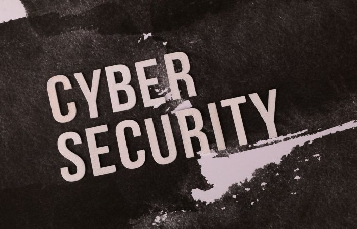 Cyber security concept shown on grunge-style background highlights the importance of digital protection.