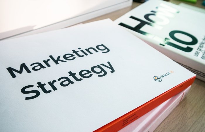 A detailed view of marketing strategy documents with close focus on text, ideal for business and finance content.